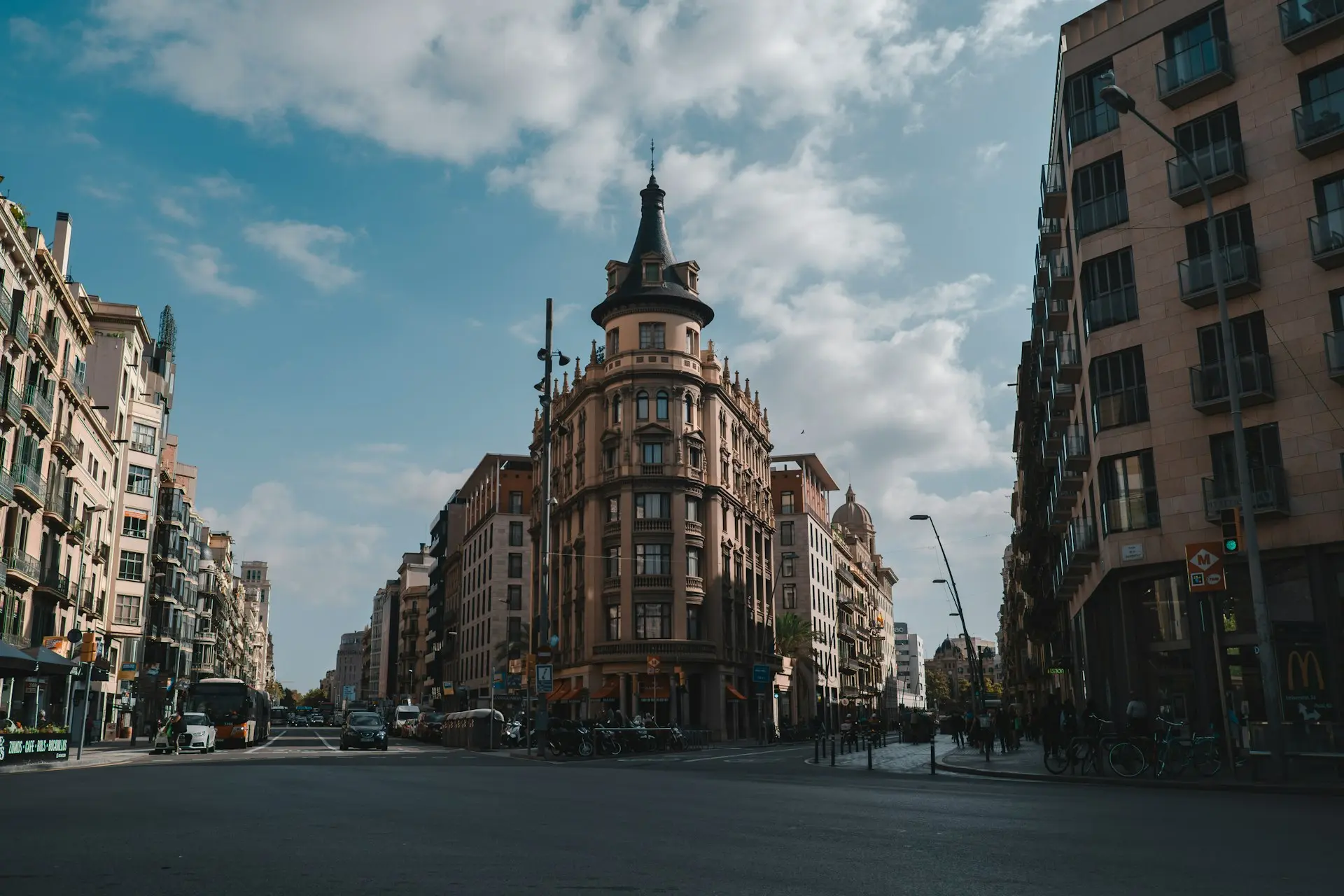 a city street filled with lots of tall buildings